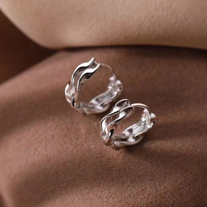 Silver Mobius knot double hoop earrings with polished twisted design for women
