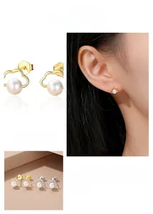 Close-up of hollow cloud pearl earrings with S925 silver hallmarks and gold plating