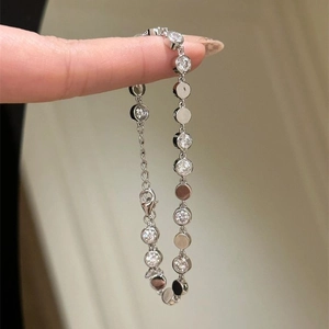 Silver vintage chain bracelet with round cut zircon stones and lobster clasp closure