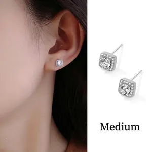 Minimalist silver square stud earrings with pave crystals shown on model and close-up