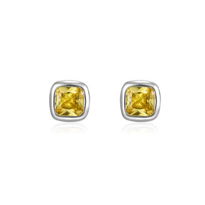 Minimalist square yellow zircon stud earrings with silver bezel setting on white background