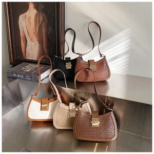 Close-up of woven texture shoulder bags in five colors with vintage metal buckle