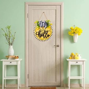 Detail of hello lemon door sign with fabric bow and realistic greenery decoration
