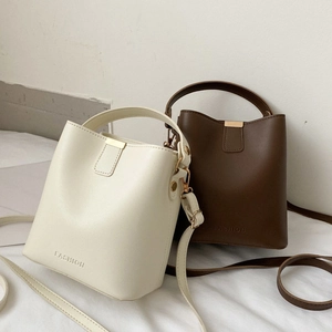 Women Fashion Embossed PU Leather Bucket Bag Minimalist Versatile Crossbody Handbag With Hand Strap And Adjustable Shoulder Strap