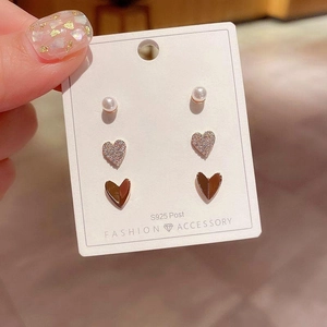 Detailed set of three heart and pearl earrings with S925 silver posts in rose gold finish