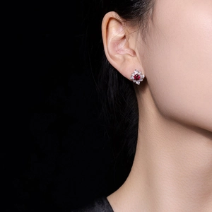 Elegant French vintage flower stud earrings with red zircon and sparkling white diamonds