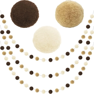 Felt ball garland with pom poms in earthy brown and beige for festive home decoration