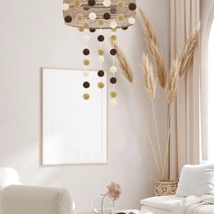 Boho felt ball garland with woven base in earthy brown, khaki and cream tones