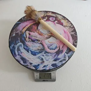 Detailed view of shamanic dragon frame drum and plush mallet weighing 213.5 grams