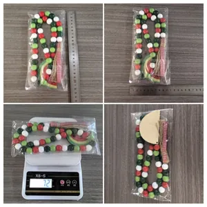 Watermelon wooden beads garland measurement and weight display with red tassel