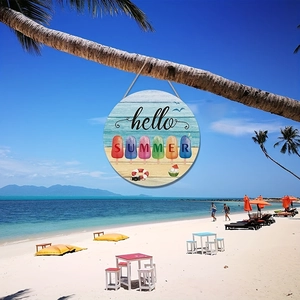 Round wooden Hello Summer sign featuring a colorful popsicle and beach design on a palm tree