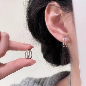 Elegant multi-layered cubic zirconia hoop earrings in minimalist silver finish