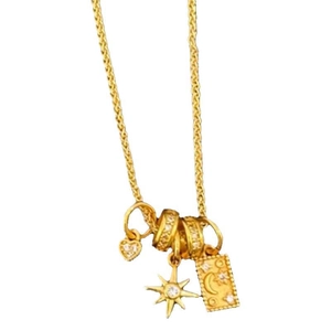 Collana celeste dorata con ciondoli a stella, cuore e luna crescente con cristalli