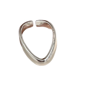 Minimalist silver V-shaped wavy open ring with a polished metallic finish on white background