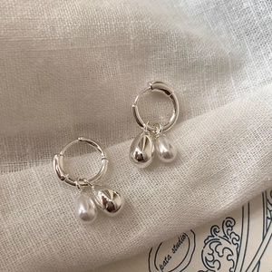 Minimalist silver hoop earrings with polished metal bead and teardrop pearl drops