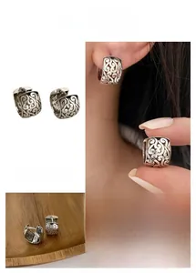 Detail of S925 sterling silver stamp on vintage geometric hollow cloud earrings