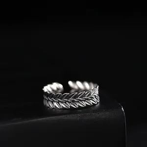 Vintage oxidized silver wheat ear open ring with detailed leaf texture on black base