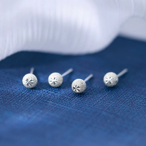 Frosted silver ball stud earrings with starburst engraving in minimalist Korean style
