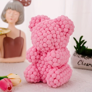 Detail of pink foam ball teddy bear figurine for Mother's Day and Valentine's Day decor