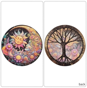 Detail of Shamanic hand drum showing Sun Moon face art and Tree of Life on back