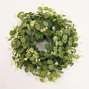 Artificial eucalyptus and money leaf wreath with cream buds on white background