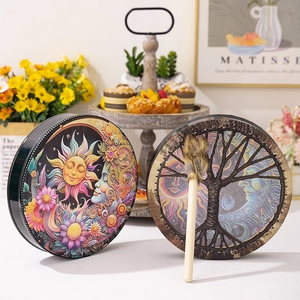 Handmade Siberian Shamanic drums featuring sun moon and tree of life art with drumstick