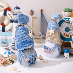 Nautical beach gnomes with sea stars, stripes and ocean life signs in a summer setting