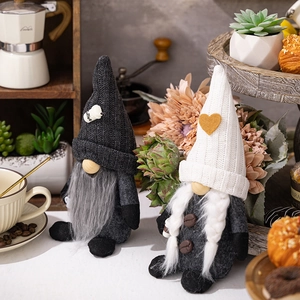 Detail of coffee gnome ornaments with knitted hats and coffee bean buttons