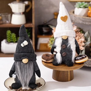 Close-up of coffee gnome plush decor featuring knitted hats and artificial fur beards