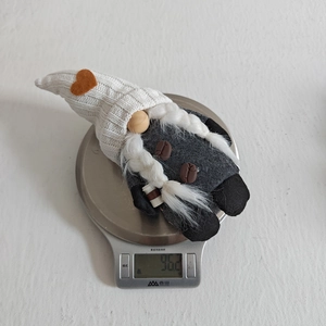Weight display of 96.2g for the coffee gnome decor on a digital scale closeup