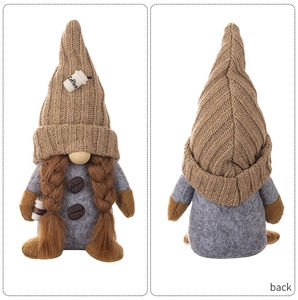 Front and back detail of a coffee gnome plush with knitted hat and coffee cup prop