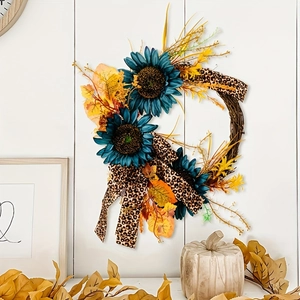 Blue sunflower autumn wreath with leopard ribbon and maple leaves on a natural vine base