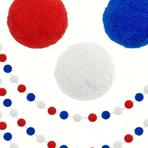 Close-up of red, white, and blue plush pom pom garland for Independence Day party decor