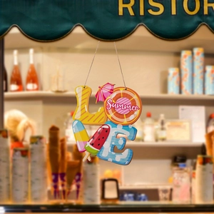 Detail of colorful wooden LOVE summer wall plaque with beach and ice cream elements