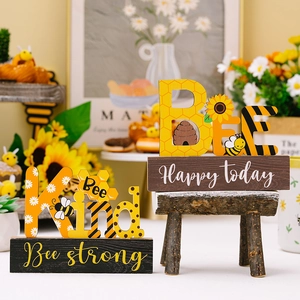 Bee Kind and Bee Happy decorative wooden signs with sunflower and honeycomb patterns