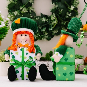 St. Patrick's Day plush doll figurines with green hats and clover gift box bases