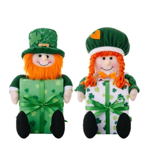 Saint Patrick's Day plush gnome dolls with green clovers and festive gift boxes