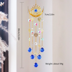 Bohemian evil eye sun catcher with golden alloy frame and blue crystal prisms for home decor