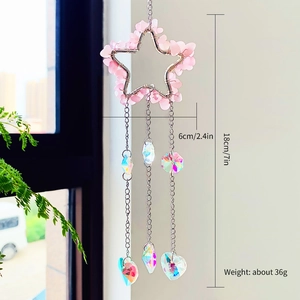 Detail of pink rose quartz star wall hanging with iridescent crystals and dimensions
