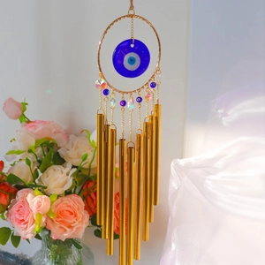 Bohemian Evil Eye wind chime with 9 golden tubes and crystal beads for garden decor