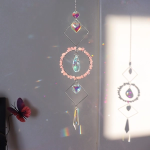 Bohemian crystal suncatcher with pink natural stones and rainbow light refraction