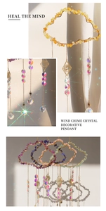 Detailed view of cloud-shaped suncatcher with raw crystals and prism ball hanging