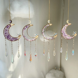 Set of four moon suncatchers with purple crystals and hanging golden prisms for garden