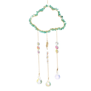 Cloud-shaped suncatcher with green stones and sparkling crystal prisms hanging on gold chains