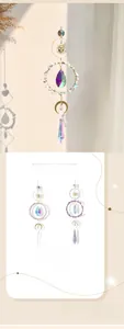 Detail view of crystal suncatcher showing metal moon frame and colorful prisms