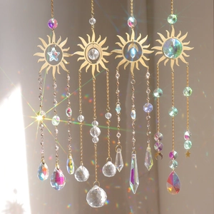 Golden sun crystal suncatcher set featuring stars and moon prisms with rainbow light effects