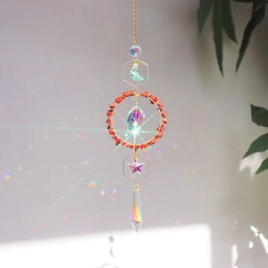 Crystal suncatcher wind chime with moon frame, red stones and faceted rainbow prism pendant
