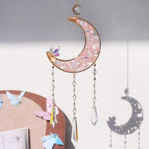 Golden moon suncatcher with rose quartz stones and faceted crystal prisms for home decor