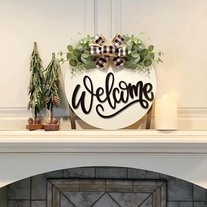 White wooden welcome wreath with eucalyptus leaves and black white checkered bow decor