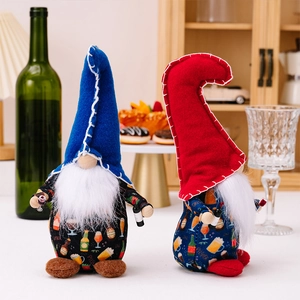 Close-up of Independence Day plush gnomes holding beer bottles with festive party decor